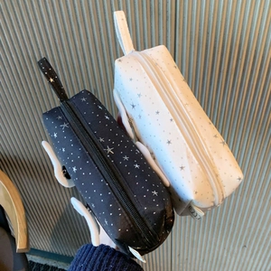 Star pattern pencil cases with 3D wings and convenient top handles for stationery