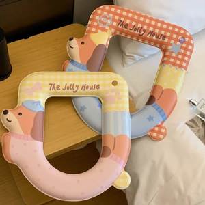 Detail of waterproof U-shaped toilet seat pads with cute cartoon dachshund patterns