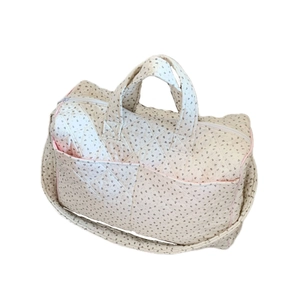 Quilted floral tote bag with large capacity for travel and fitness featuring pink trim