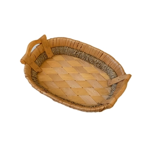 Oval hand-woven rattan fruit tray with wooden handles in a natural pastoral style