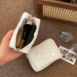 Portable white star makeup bag with silver embroidery for travel and cosmetics storage