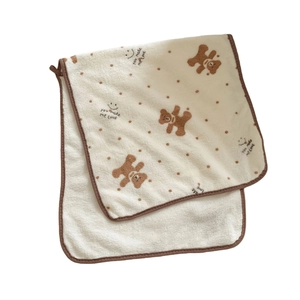 Cute teddy bear coral fleece towel with brown polka dots and soft absorbent texture