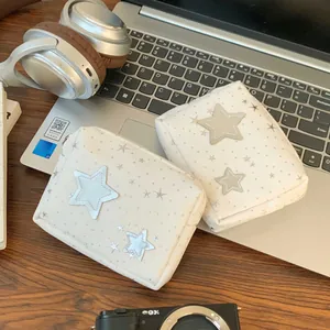 Star pattern storage pouch set showing large and small sizes with star embroidery