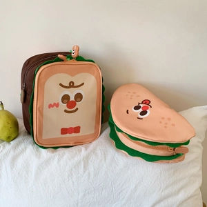 Cute toast and sandwich shaped makeup bags with cartoon faces on soft white fabric