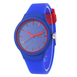 Minimalist blue silicone strap sports watch with red dial accents and quartz movement