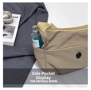 Detail view of khaki nylon crossbody bag side pocket with perfume bottle storage