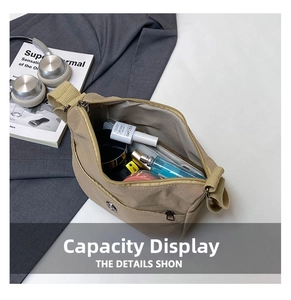 Detail view of khaki nylon crossbody bag showing spacious interior for daily essentials