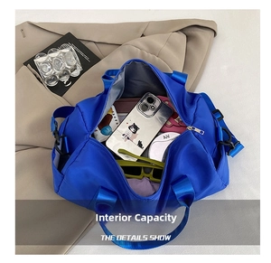 Interior view of royal blue travel bag showing large capacity for personal essentials