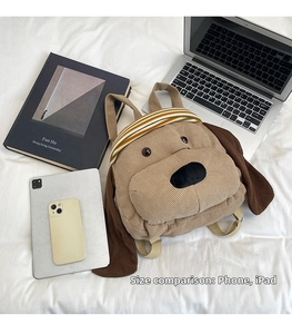 Puppy shaped khaki corduroy backpack size comparison with tablet and laptop
