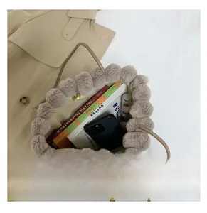 Spacious interior of plush tote bag showing storage capacity for phone and books