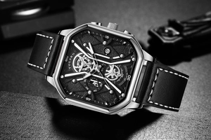 Close-up of square silver watch case with black leather strap and multi-dial face