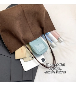 Spacious brown matte tote bag interior showing large capacity for daily essentials