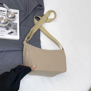 Light khaki nylon hobo bag for women with adjustable strap for daily commute and travel