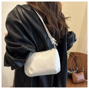 Chic white PU leather underarm bag with knot strap detail and stitching elements
