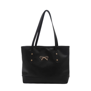 Minimalist black PU leather tote bag with gold bow clasp and large capacity for commuting