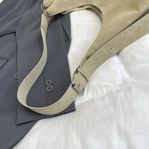 Retro khaki suede large capacity tote bag with adjustable silver buckle on a blazer