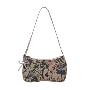 Floral jacquard underarm bag with dragonfly print and beaded bow charm on white background