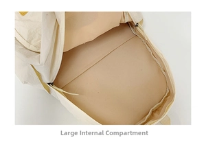 Detail showing internal laptop compartment of the beige duck backpack for students