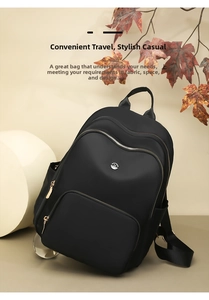 Macro detail of high-quality waterproof nylon backpack with elegant gold zippers