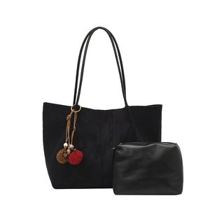 Large black suede tote bag set with decorative pom-pom and matching leather pouch