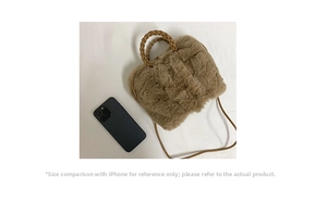 Compact brown plush handbag size comparison with an iPhone showcasing its small dimensions