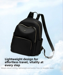 Lightweight black nylon backpack with gold zippers weighing only 0.405kg for daily commute