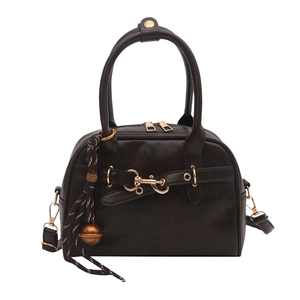 Vintage brown leather boston pillow bag with gold hardware and stylish belt detail