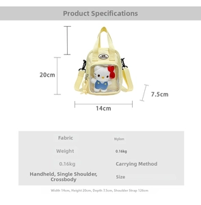 Detailed view of yellow nylon crossbody bag with transparent window showing plush toy