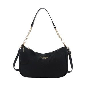 Minimalist black crescent shoulder bag with gold chain and adjustable leather strap