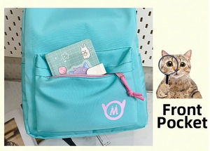 Detail of mint green backpack front pocket with pink zipper and round letter logo