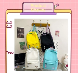 Detailed display of color options for student backpacks in yellow, black, white, and green