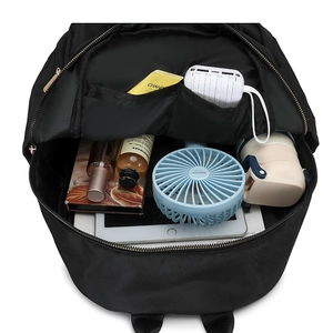 Large capacity black backpack with multiple compartments and gold zippers for travel