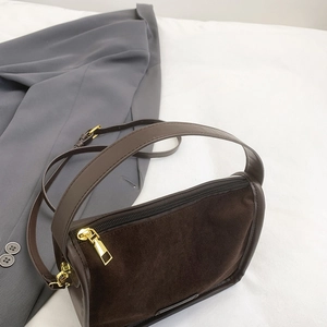 Retro dark brown frosted suede handbag with gold hardware and stylish crossbody strap