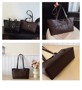 Detail view of matte PU tote bag featuring side buckle and adjustable strap handle