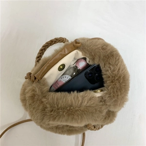 Brown plush cloud handbag with braided handle and magnetic clasp closure for daily use