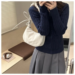 White crescent shoulder bag with pleated knot strap and Eureka Moment logo detail