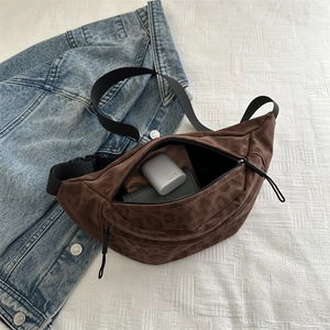 Leopard print faux suede chest bag with adjustable strap and interior storage space