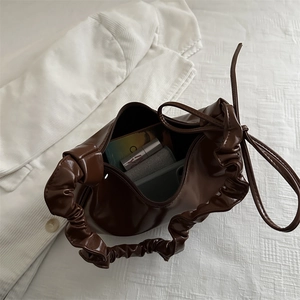 Minimalist dark brown soft PU leather underarm bag with stylish scrunchie handle design