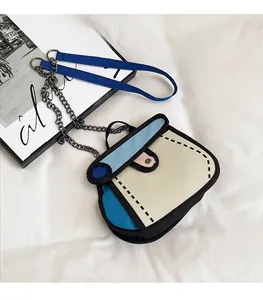 Detail of 2D cartoon style crossbody bag with comic outlines and metal chain strap