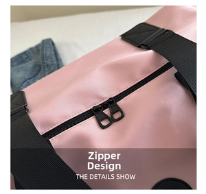 Close-up of durable pink nylon fabric with high-quality dual zipper on the gym bag