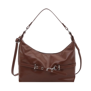 Retro dark brown crescent shoulder bag for women with polished finish and metal hardware