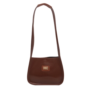 Retro brown leather bucket bag with top handle and gold logo plate for daily commute