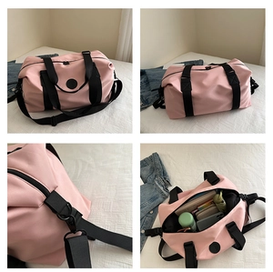 Pink waterproof oxford travel bag with spacious interior and adjustable shoulder strap