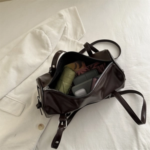 Retro chocolate brown Boston barrel bag with large capacity for daily commuting