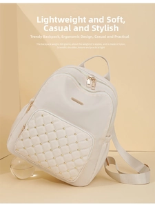 Lightweight 420g nylon backpack featuring quilted front pocket and gold stud details