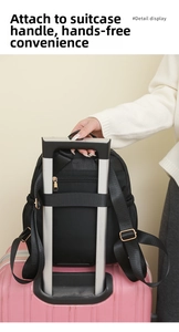 Detail of black oxford backpack with luggage strap fixed to a pink suitcase handle