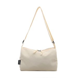 Beige nylon crossbody bag with adjustable strap and double zipper in minimalist style
