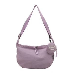 Lavender crescent nylon crossbody bag with adjustable strap and small round coin purse