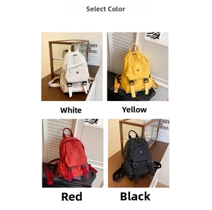 Selection of waterproof nylon backpacks in white, yellow, red, and black color options