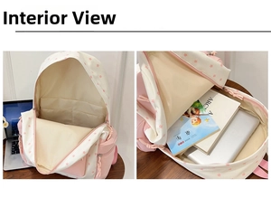 Detail view of pink star backpack interior showing laptop compartment and pockets